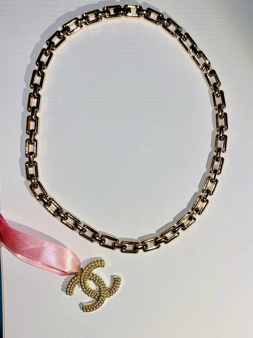 CHANEL Gold CC Pendant with Pink Ribbon New Elegant Chain